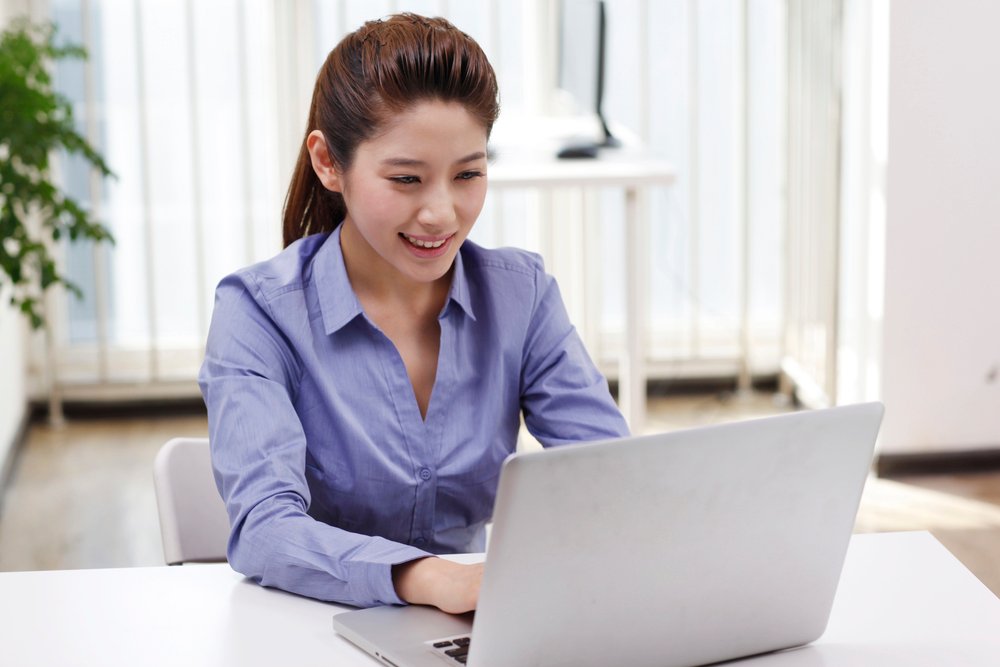 Businesswoman using laptop