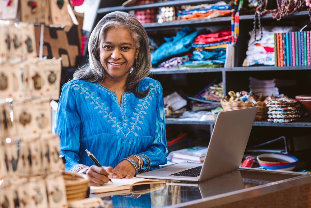 A photo of a shop owner